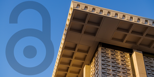 Open Access lock symbol and Hayden Library roof against sky background